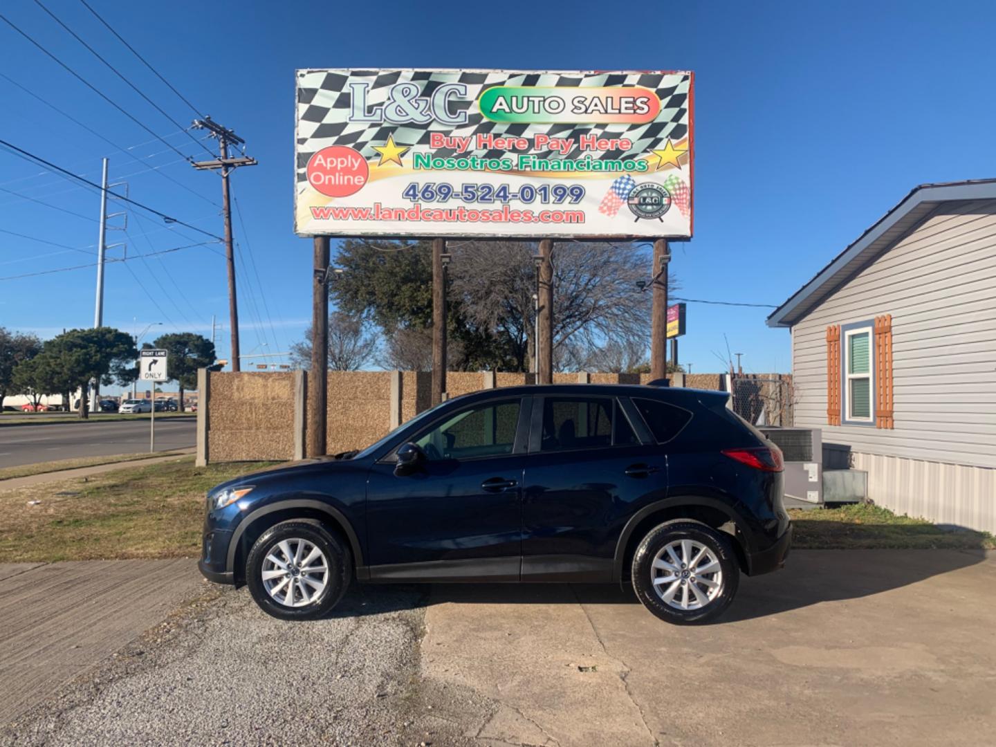 2014 Blue /Tan Mazda CX-5 Touring (JM3KE2CY1E0) with an 2.5L L4 DOHC 16V engine, Automatic transmission, located at 1830 North Belt Line Road, Irving, TX, 75061, (469) 524-0199, 32.834373, -96.993584 - Photo#0